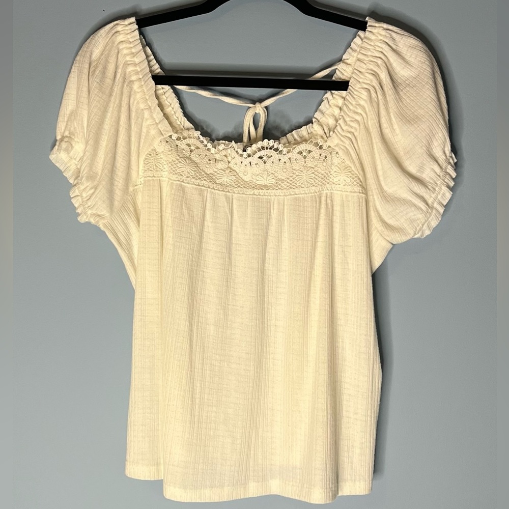 Romantic white top with crochet detail